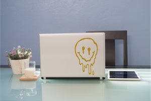 aufkleber-fuer-laptop-schmelzender-smiley-gold
